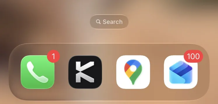 KAST app icon in an iPhone dock