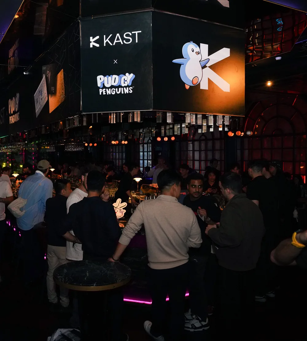 Crowd under the KAST x Pudgy Penguins sign at the Pengu Card Party in Seoul