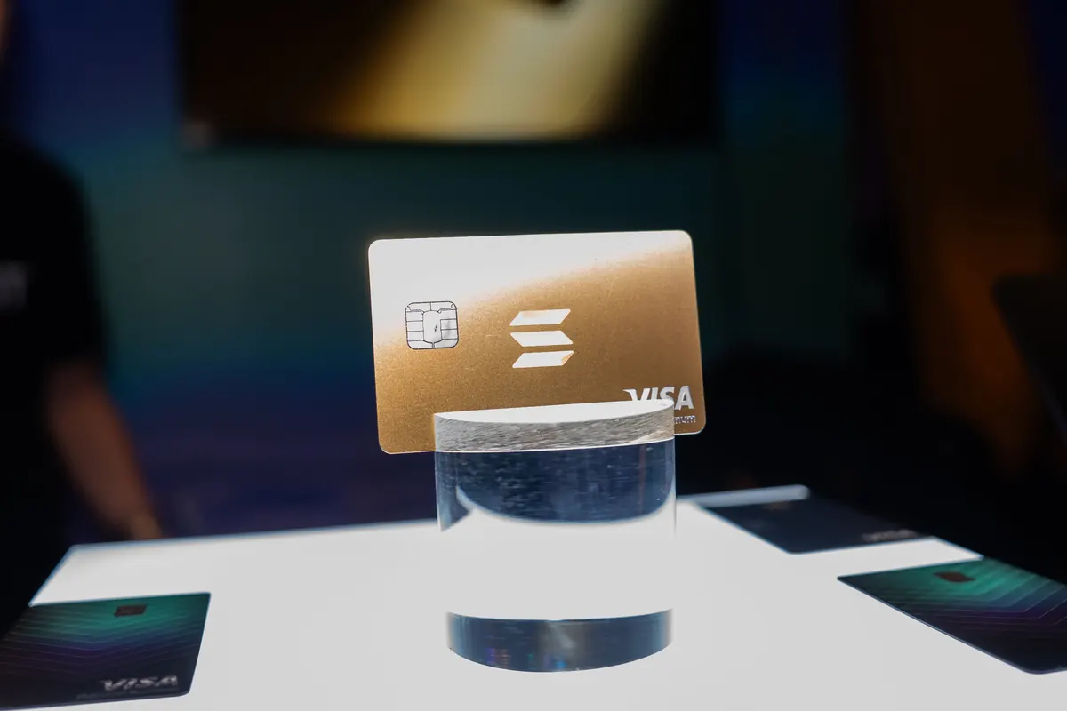 KAST Solana Gold card on a display stand
