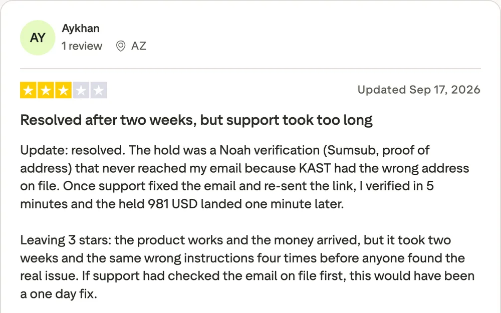 Three-star Trustpilot review of KAST: a held transfer resolved after two weeks
